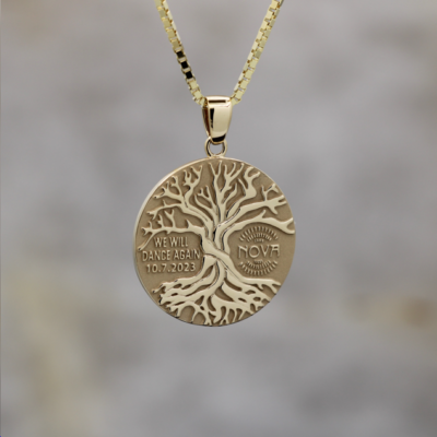 Tree of life symbol, along with representations of the Nova Music Festival and the defiant slogan "We Will Dance Again".