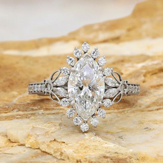 Marquise cut halo engagement ring 
