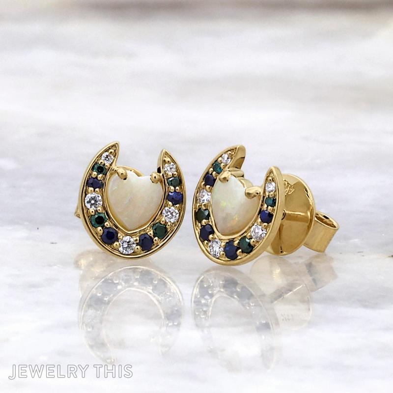 Dimond horse shoe earrings yellow gold animal