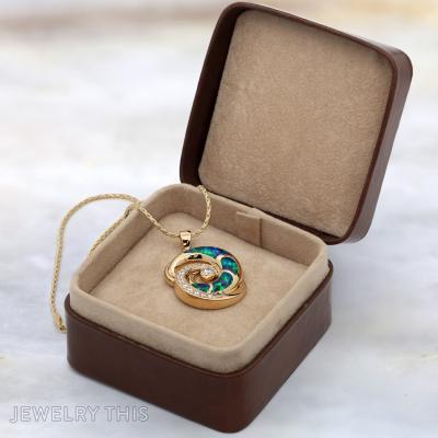 gold diamond and blue opal wave pendant