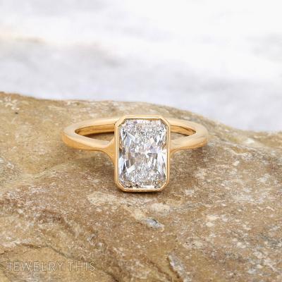 radiant yellow gold solitaire