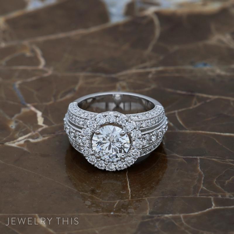 three row halo engagement ring.
