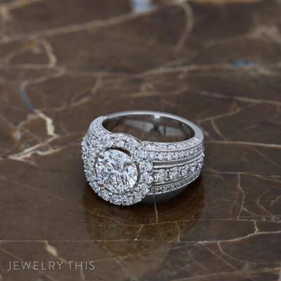 three row halo engagement ring.