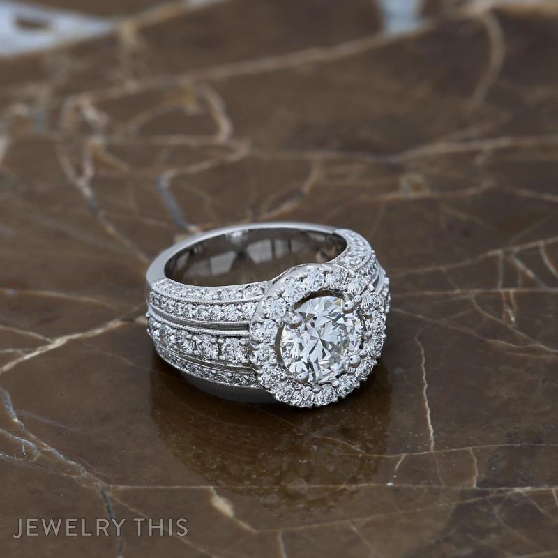 three row halo engagement ring.