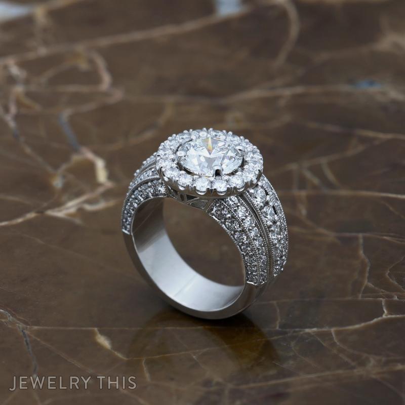three row halo engagement ring.