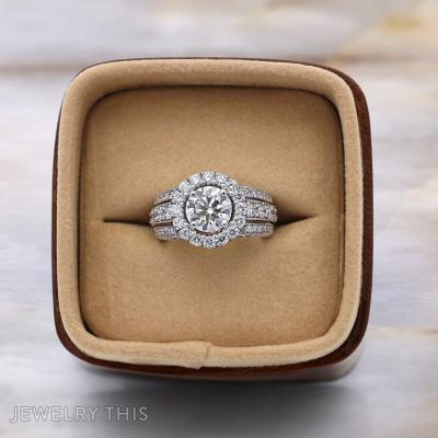 three row halo engagement ring.